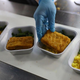 Airline employee packages in-flight meals